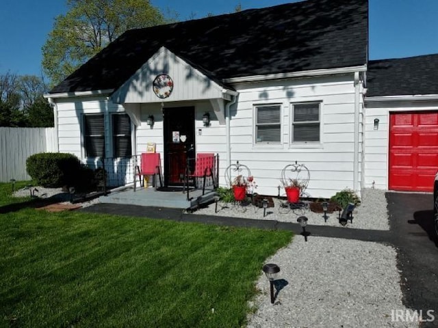 view of outbuilding with a lawn