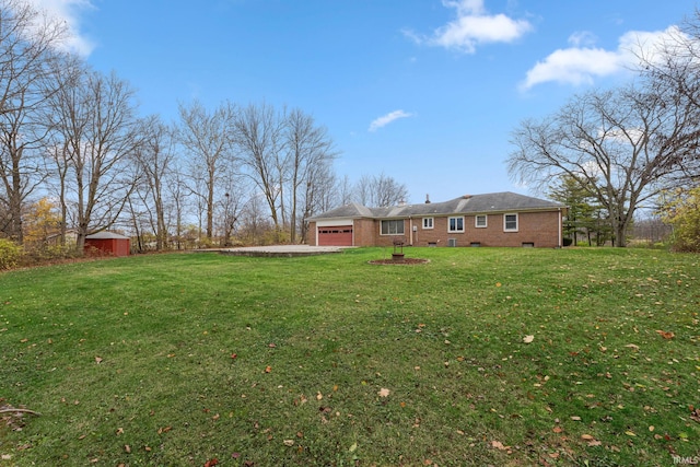 view of yard with a garage