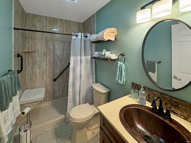 bathroom with toilet, vanity, a textured ceiling, and walk in shower