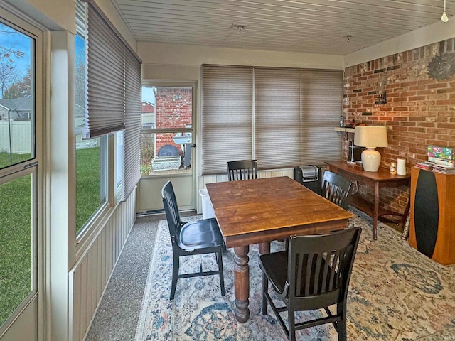 sunroom / solarium featuring wood ceiling