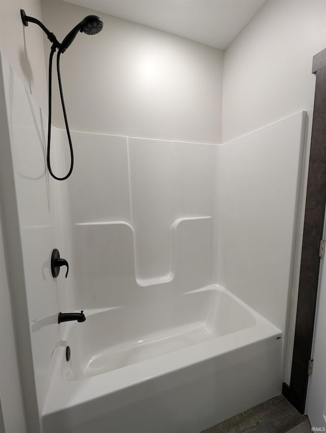 bathroom featuring washtub / shower combination