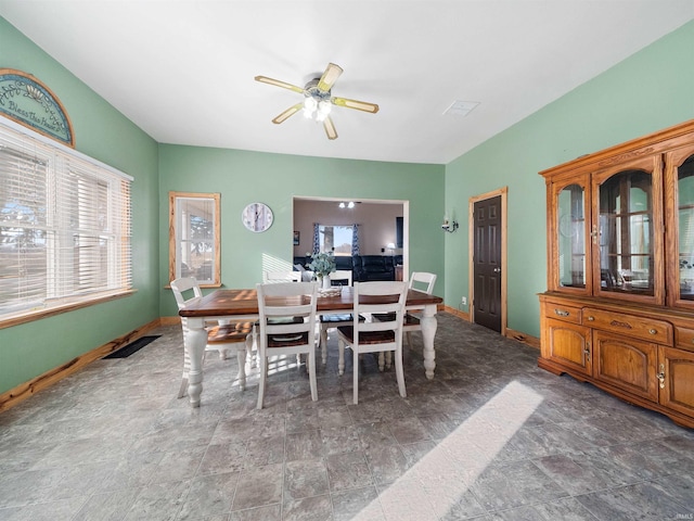 dining space with ceiling fan