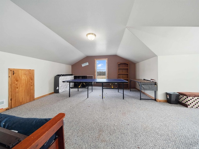 playroom with carpet and lofted ceiling