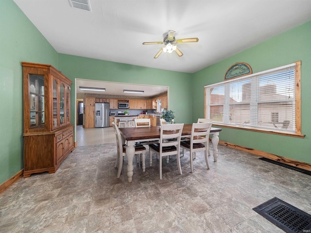 dining area featuring ceiling fan