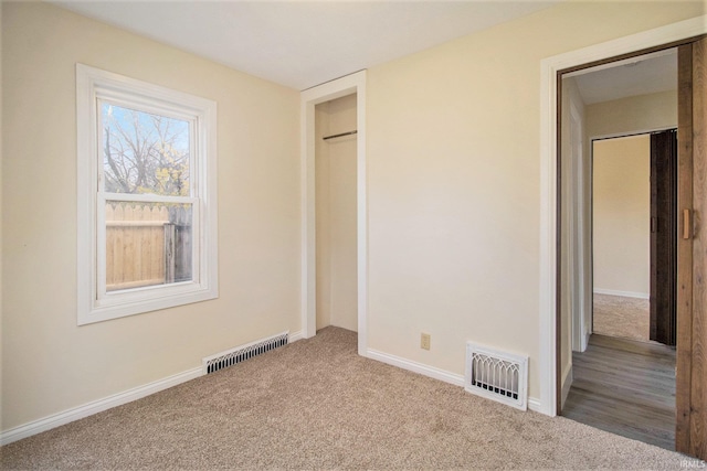 unfurnished bedroom with carpet