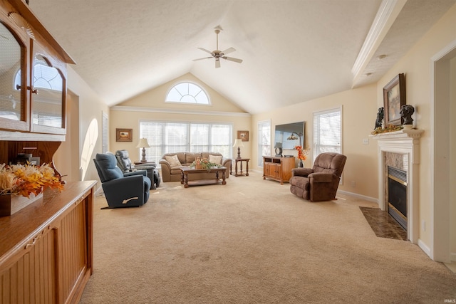 carpeted living room featuring high vaulted ceiling and ceiling fan