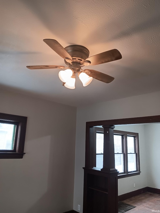 unfurnished room featuring ceiling fan