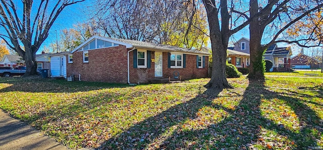 view of side of property featuring a lawn