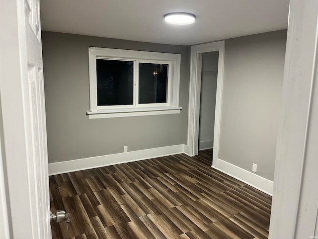 interior space with dark hardwood / wood-style floors