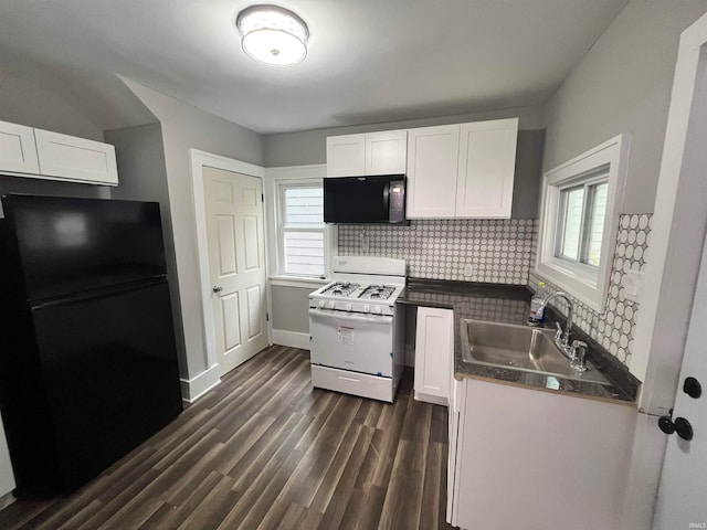 kitchen with backsplash, dark wood-type flooring, sink, black appliances, and white cabinetry