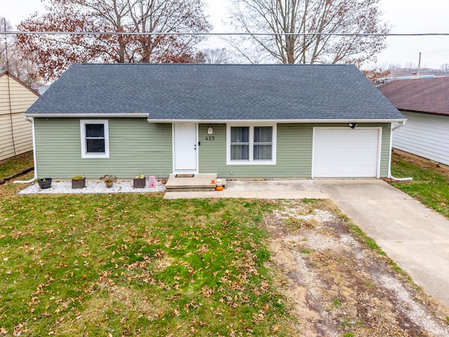 ranch-style home with a garage and a front yard