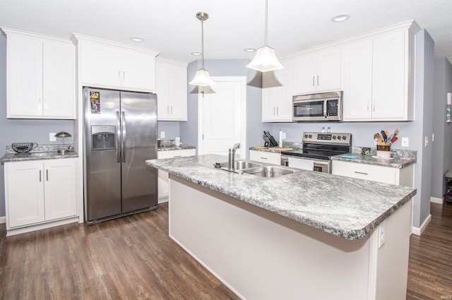 kitchen featuring dark wood-type flooring, sink, white cabinets, and stainless steel appliances