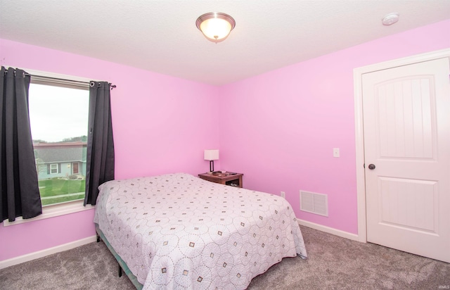 bedroom featuring carpet floors