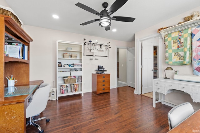 office space featuring ceiling fan and dark hardwood / wood-style floors