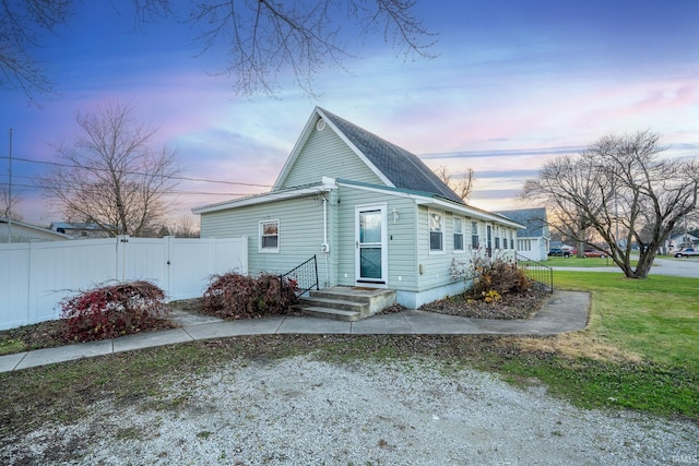 view of front of house with a lawn