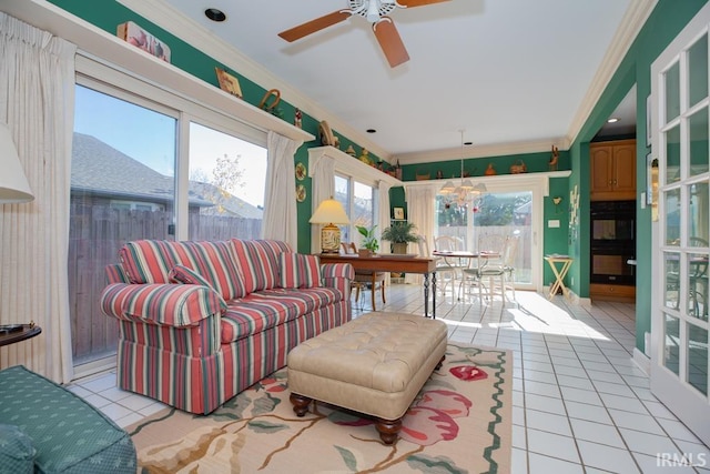 sunroom / solarium with ceiling fan and a healthy amount of sunlight