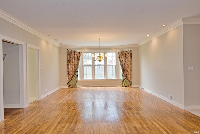 210 Shane Ct, Evansville, IN 47715 - empty room featuring light wood-style flooring, a chandelier, baseboards, crown molding, and recessed lighting