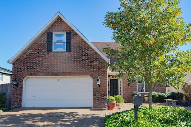 210 Shane Ct, Evansville, IN 47715 - traditional home with driveway, brick siding, and an attached garage