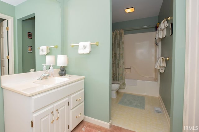 full bathroom featuring shower / bath combination with curtain, vanity, and toilet