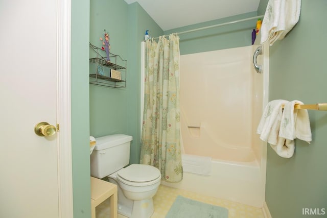 bathroom with shower / bath combination with curtain and toilet