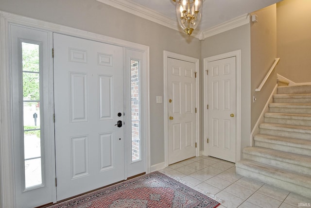 210 Shane Ct, Evansville, IN 47715 - foyer with stairway, light tile patterned floors, ornamental molding, a chandelier, and baseboards