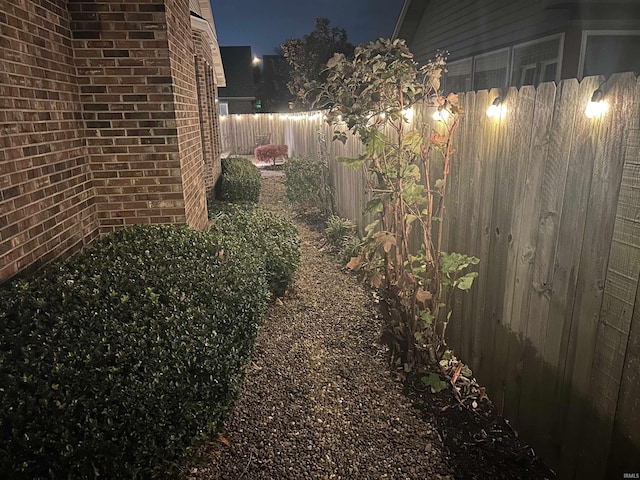 view of yard at night