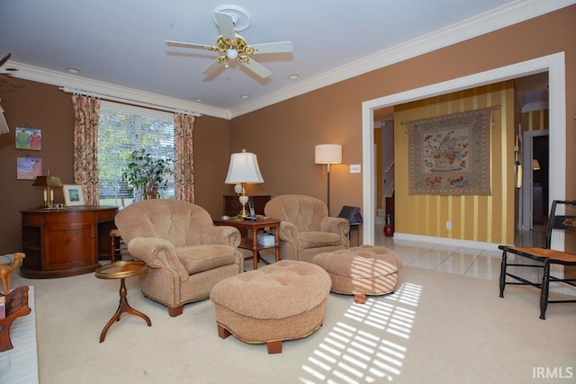 living room with ceiling fan and ornamental molding