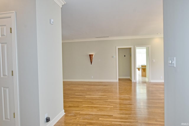210 Shane Ct, Evansville, IN 47715 - spare room with crown molding, light wood-style floors, and baseboards