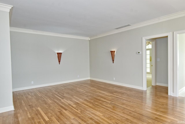 210 Shane Ct, Evansville, IN 47715 - unfurnished room featuring ornamental molding, light wood-style flooring, and baseboards