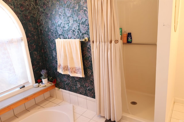 bathroom with a shower with shower curtain and tile patterned floors