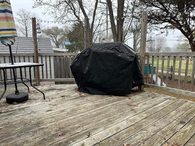 wooden deck with grilling area