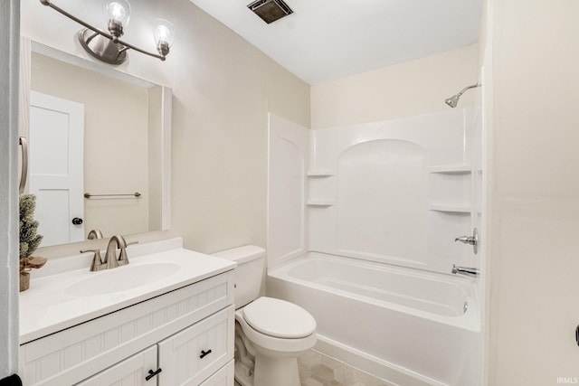 full bathroom featuring tile patterned floors, vanity, toilet, and shower / washtub combination