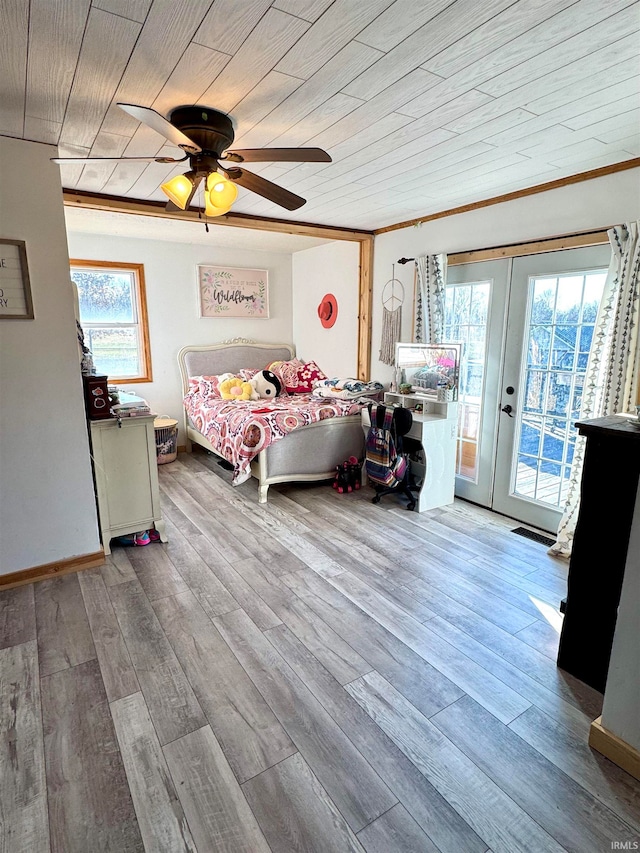 bedroom with wood ceiling, access to exterior, ceiling fan, and light hardwood / wood-style floors