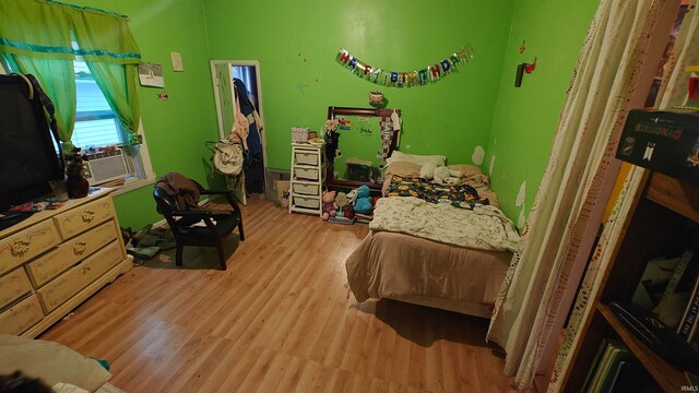 bedroom featuring light hardwood / wood-style floors