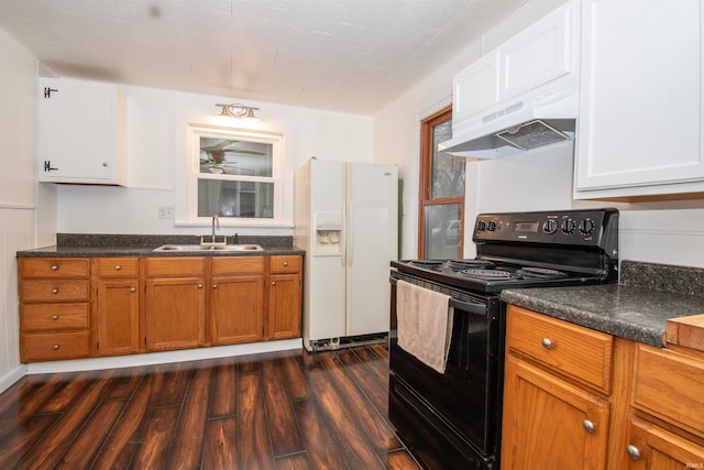 kitchen with sink, white fridge with ice dispenser, black range with electric cooktop, dark hardwood / wood-style flooring, and extractor fan