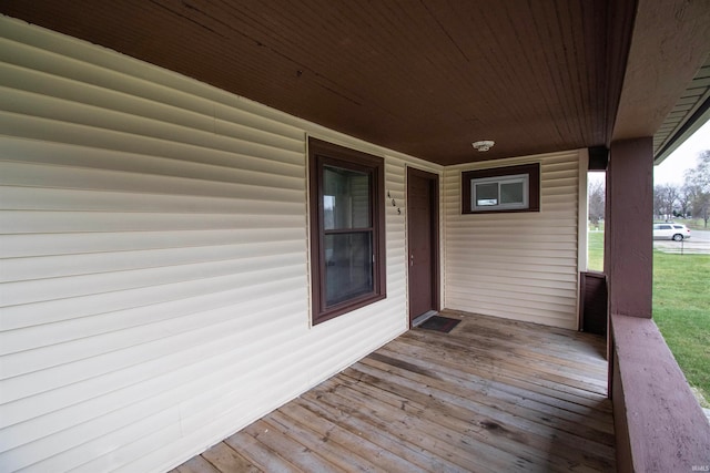 wooden deck featuring covered porch