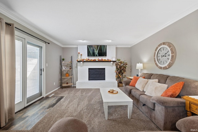 living room featuring a brick fireplace, hardwood / wood-style floors, and ornamental molding