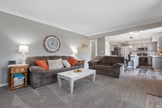 living room featuring dark wood-type flooring and ornamental molding