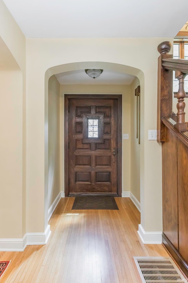 entrance foyer with light wood-type flooring