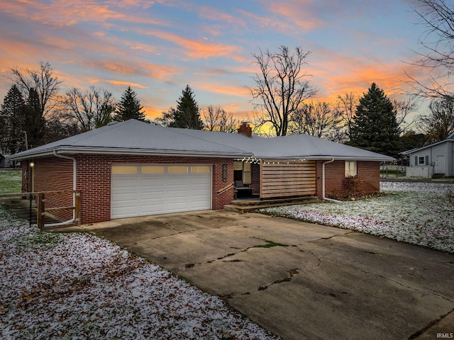 ranch-style house with a garage