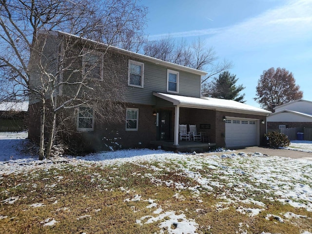 front of property featuring a porch and a garage