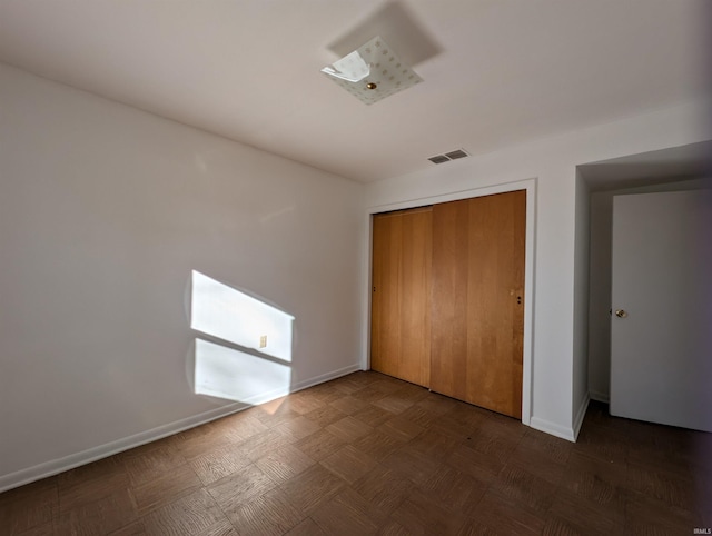 unfurnished bedroom featuring a closet