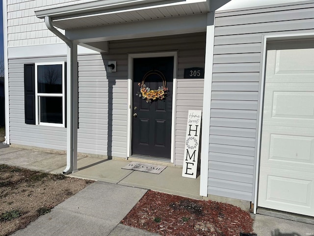 entrance to property with covered porch