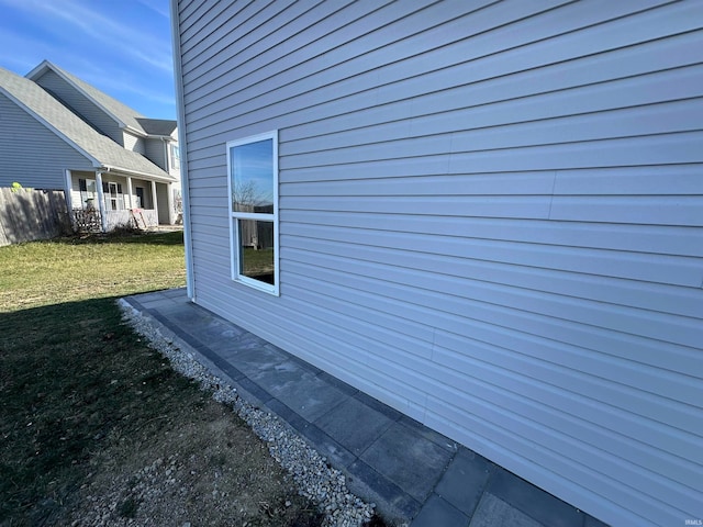 view of home's exterior featuring a yard