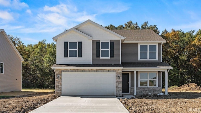 view of front of property with a garage