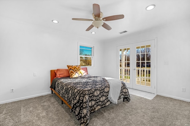 carpeted bedroom with ceiling fan, access to exterior, and french doors