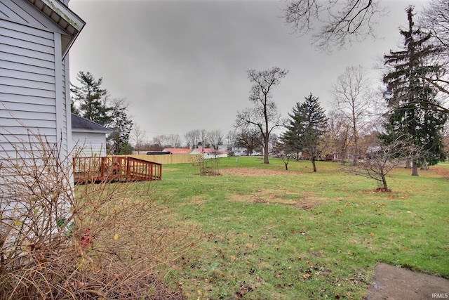 view of yard with a wooden deck