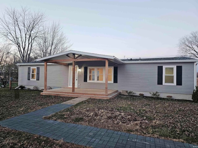 view of front of property featuring covered porch