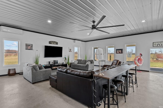 living room with plenty of natural light, a wall mounted AC, crown molding, and ceiling fan