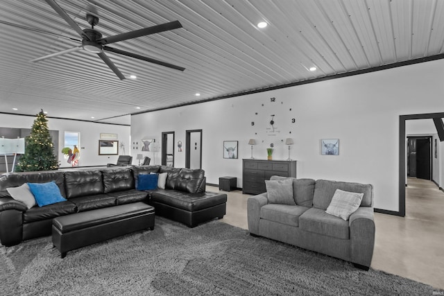 living room with wooden ceiling, ceiling fan, and crown molding